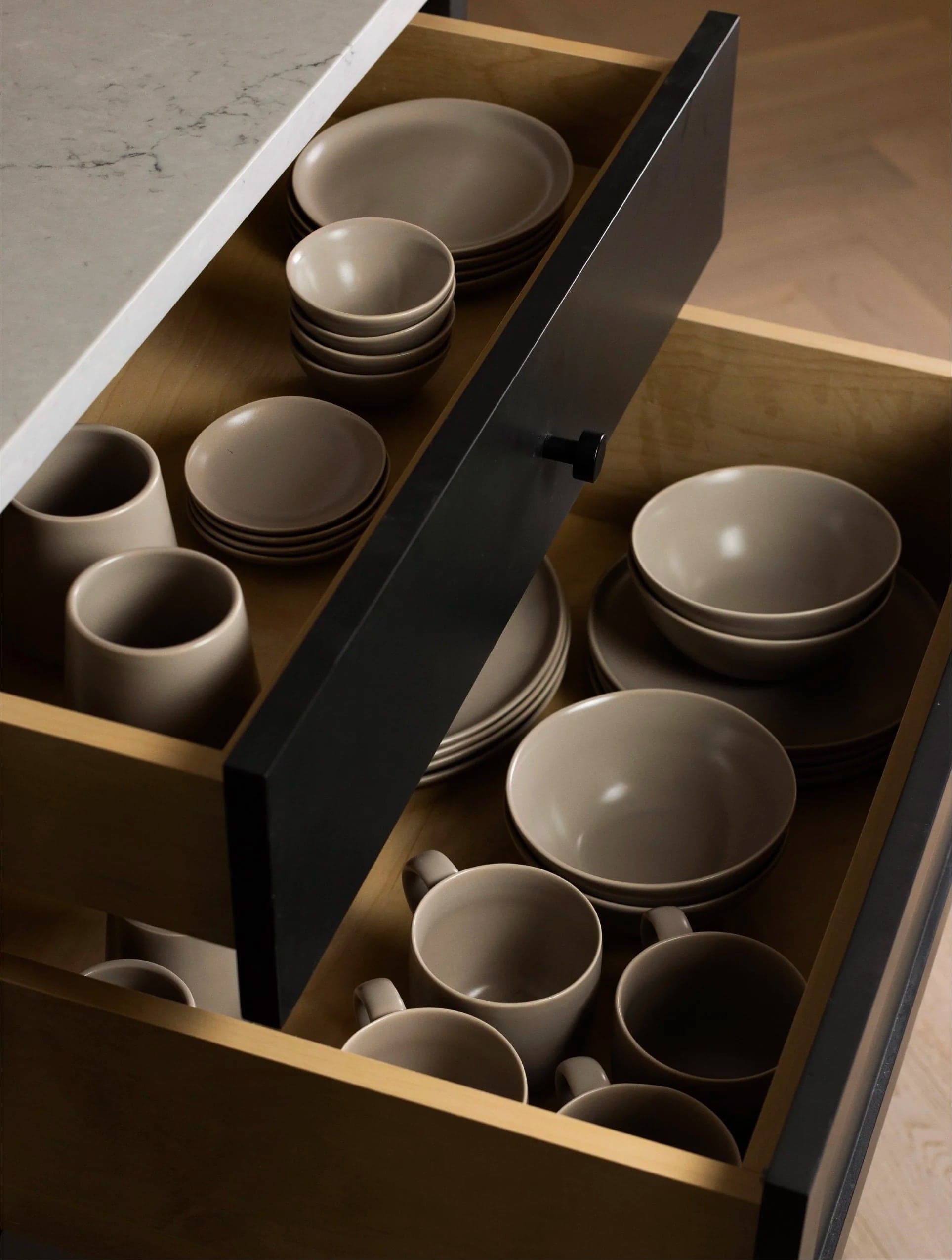Drawers full of taupe Fable dinnerware