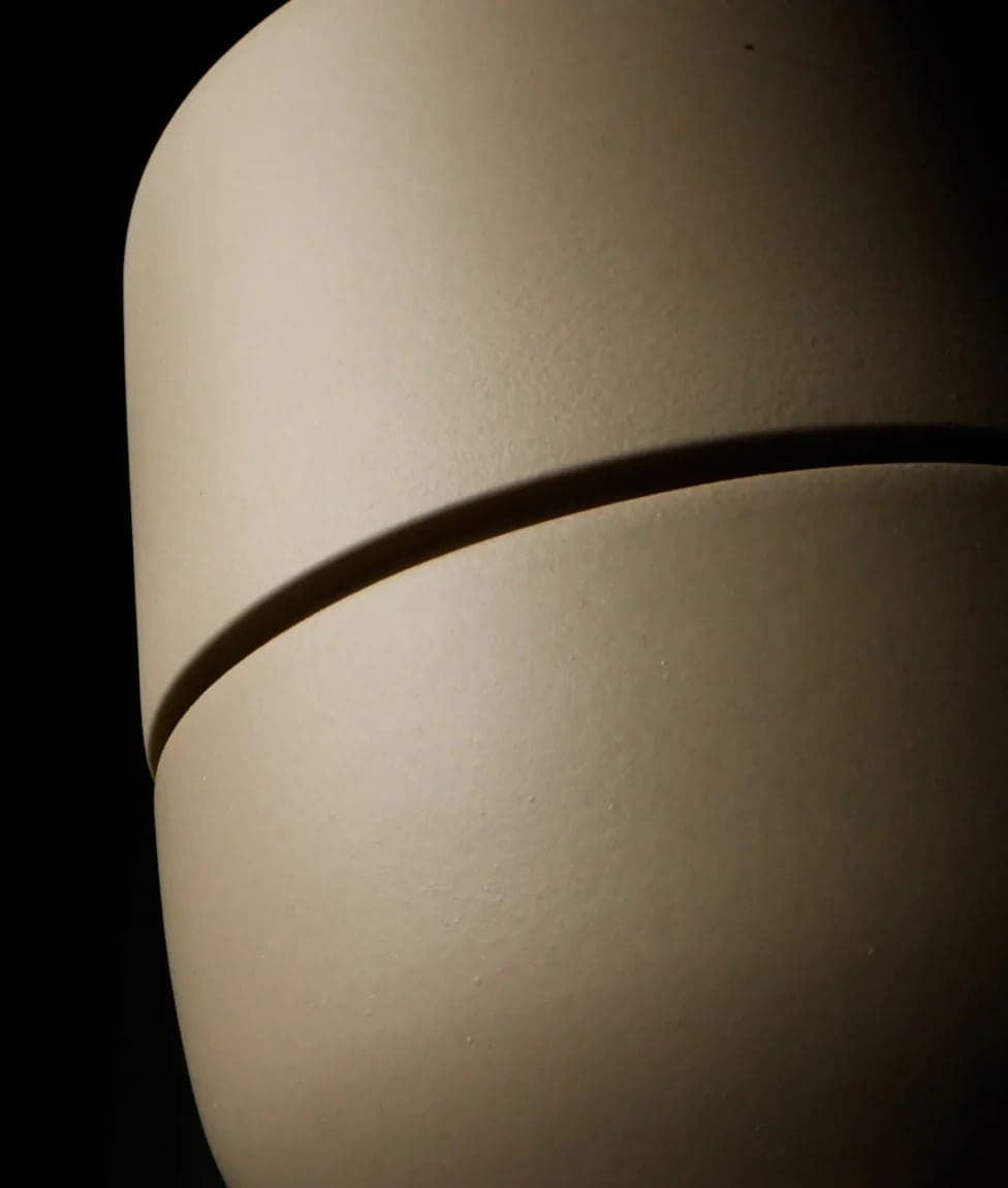 Close-up of a lamp shade in shadow
