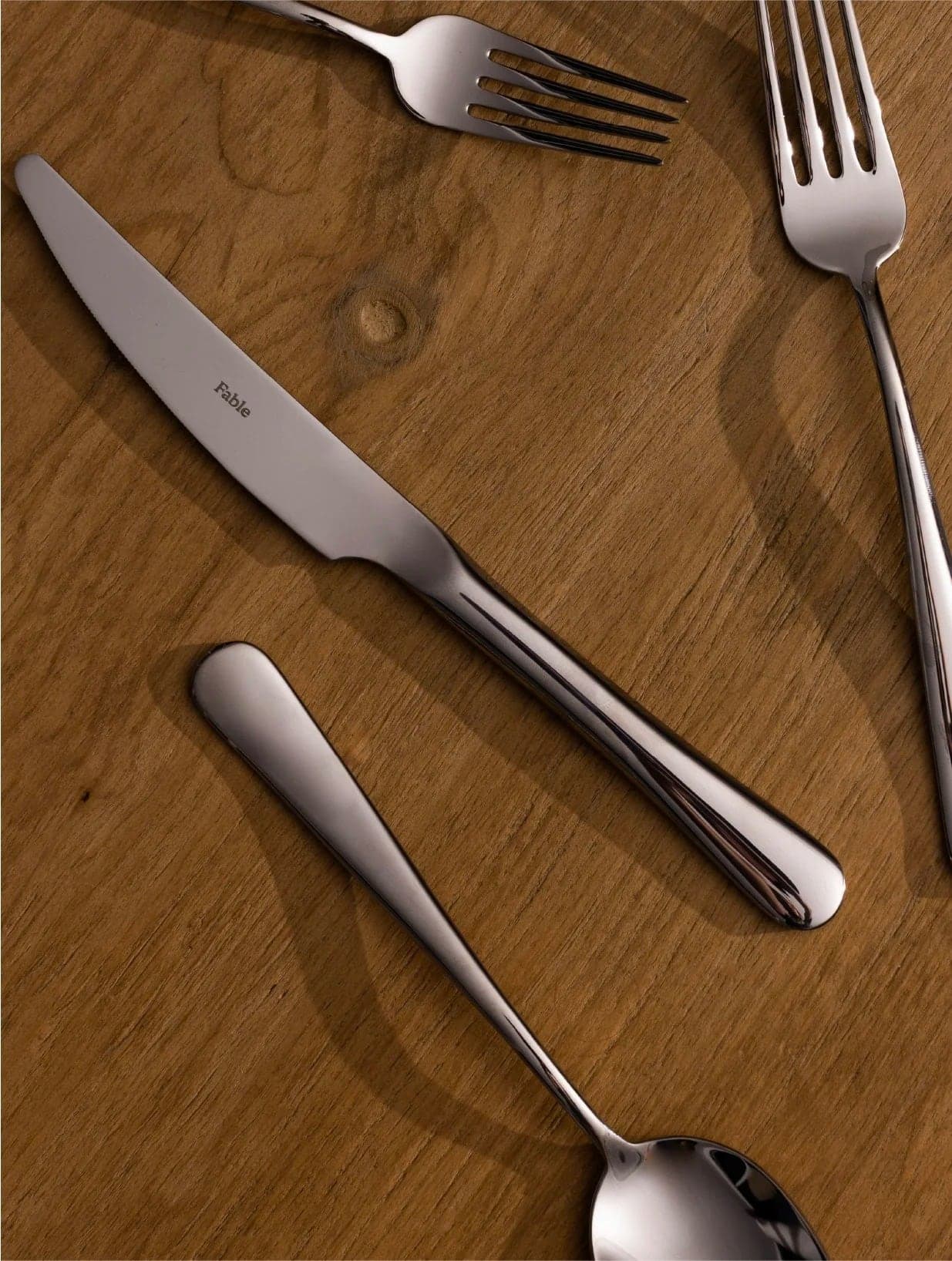 Fable cutlery on a wooden table