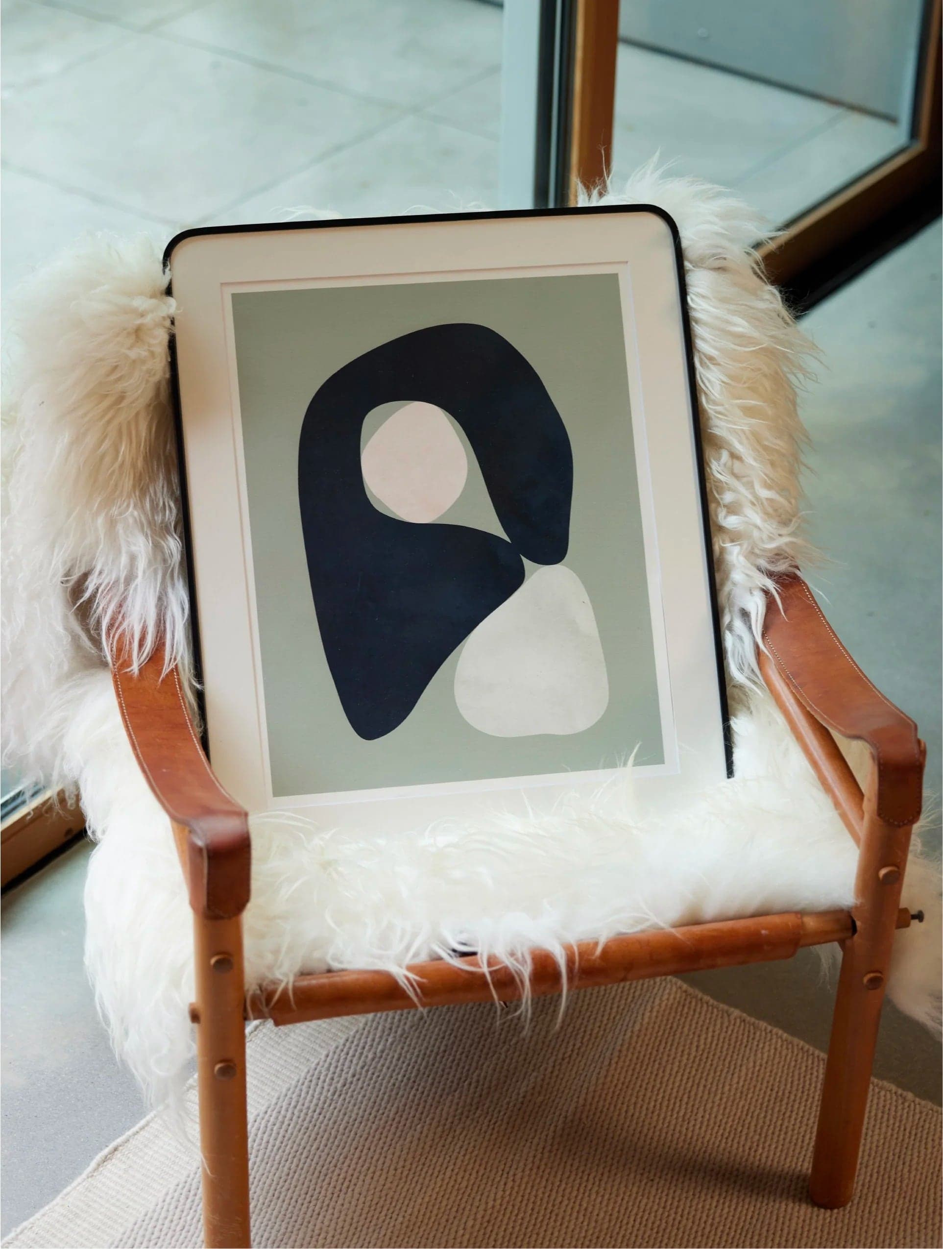 Abstract print on a sheepskin-covered chair
